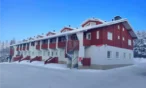 Apartment building in winter, Levi centre