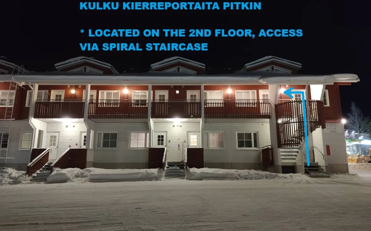 Evening view of the Levistar III building with the spiral staircase up to the 2nd-floor apartments